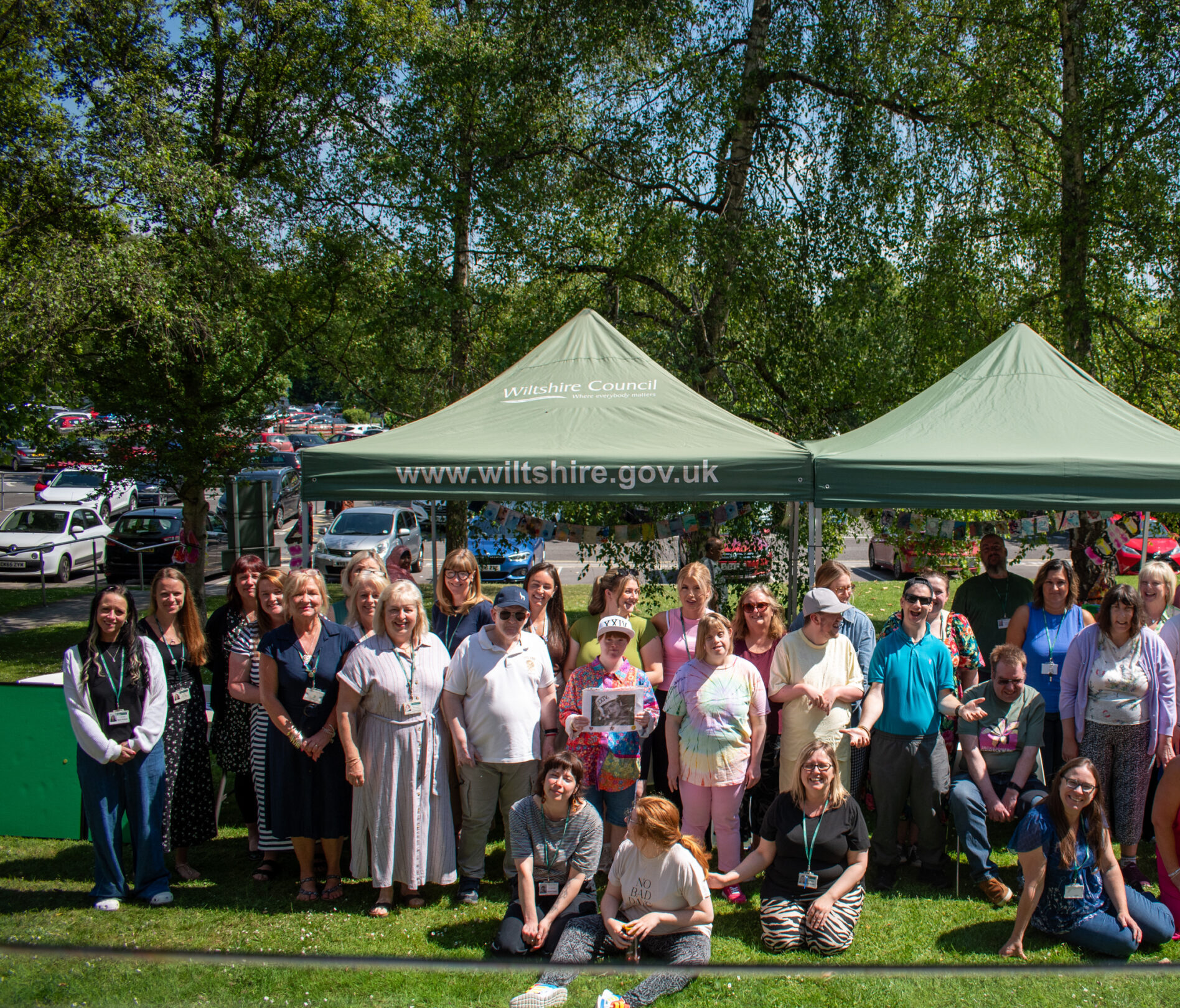 group photo of staff and customers
